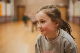A child enjoying games and activities during Derryvolgie Kids on a Friday evening at St Columba’s Church.